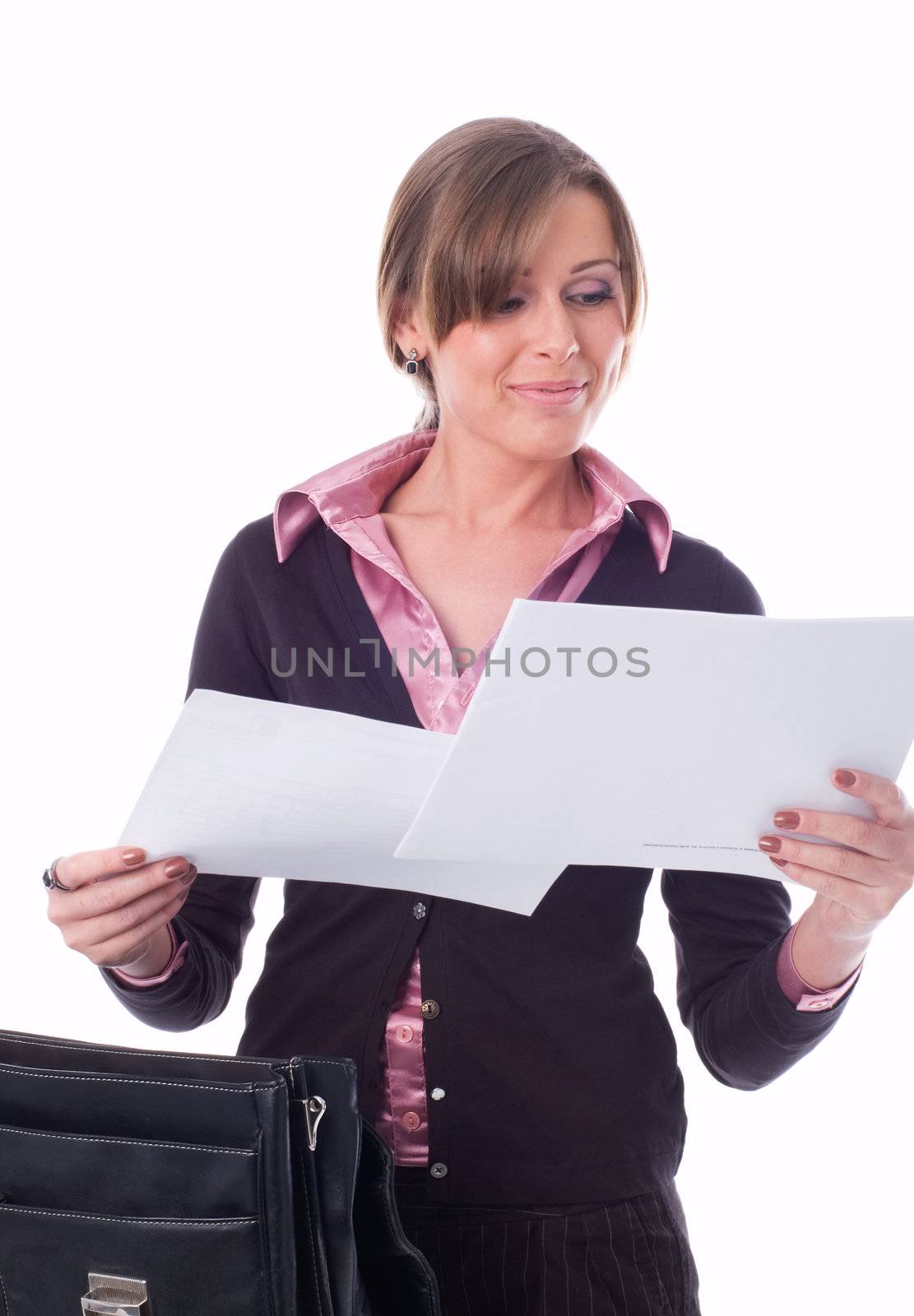 The girl has got from a portfolio of a paper and looks through them