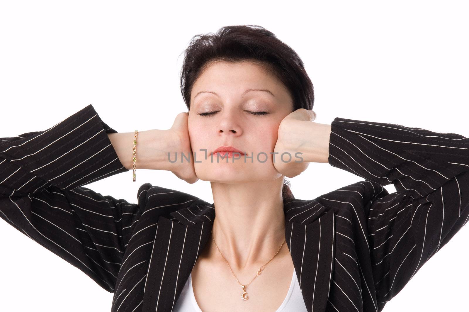 The woman in a suit has closed eyes also ears