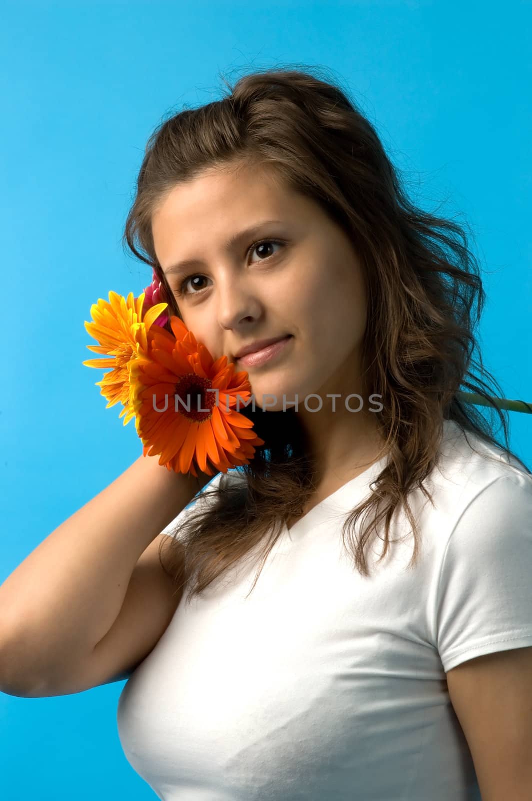 The girl with brown eyes and a bouquet of flowers
