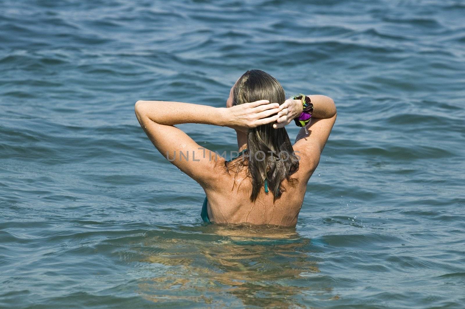 The woman bathes in Black sea