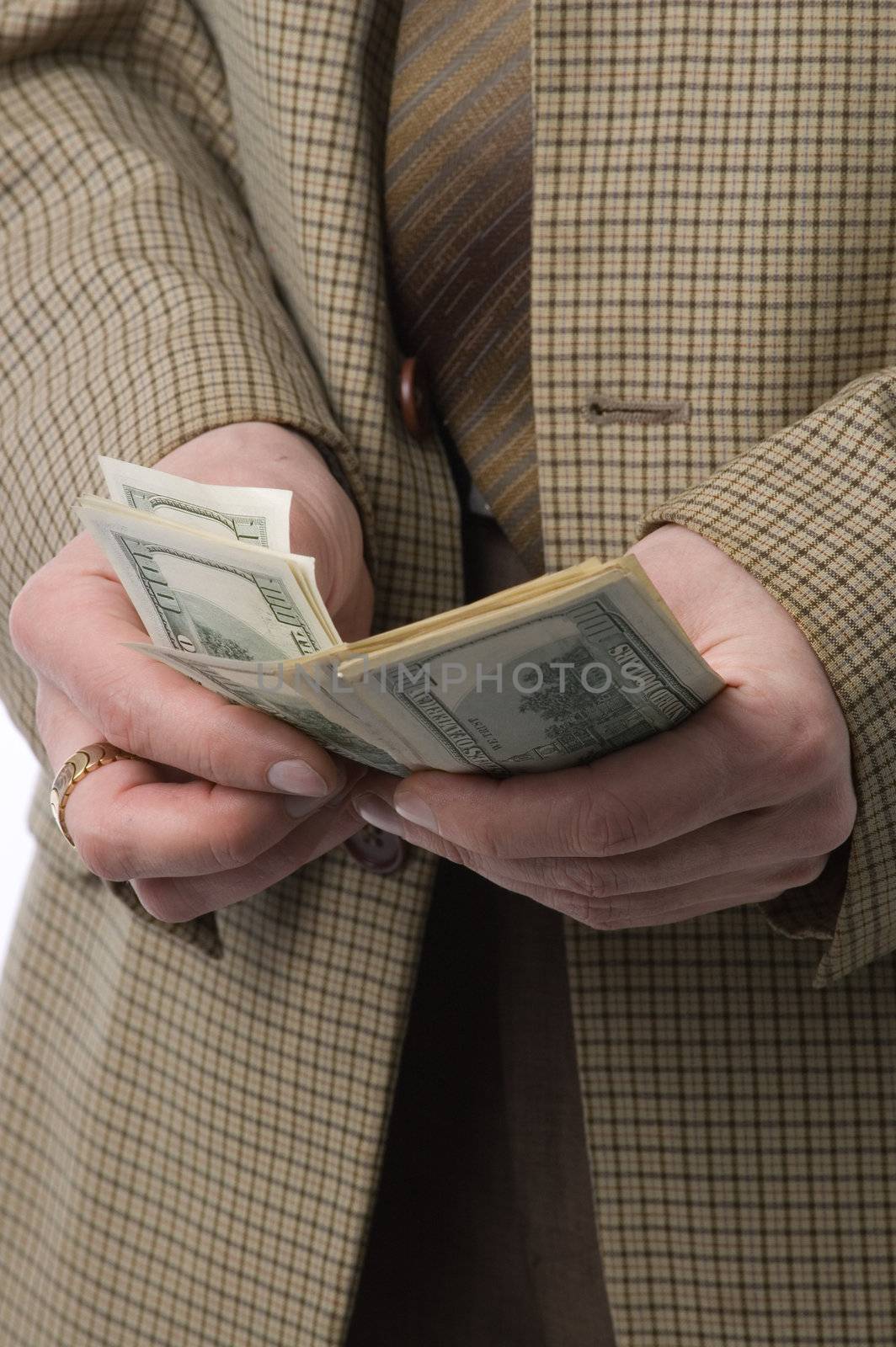 Money makes money. The man in a checkered jacket recalculates money