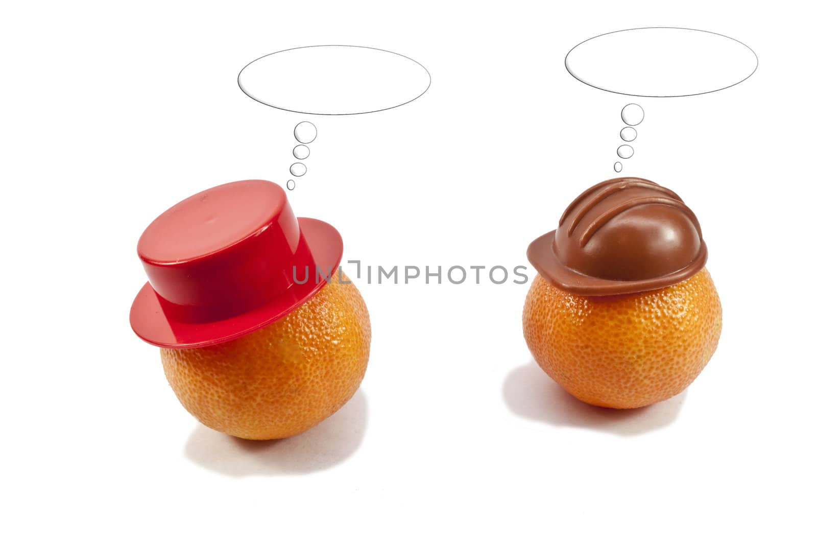 fresh tangerines in the headgear on a light background