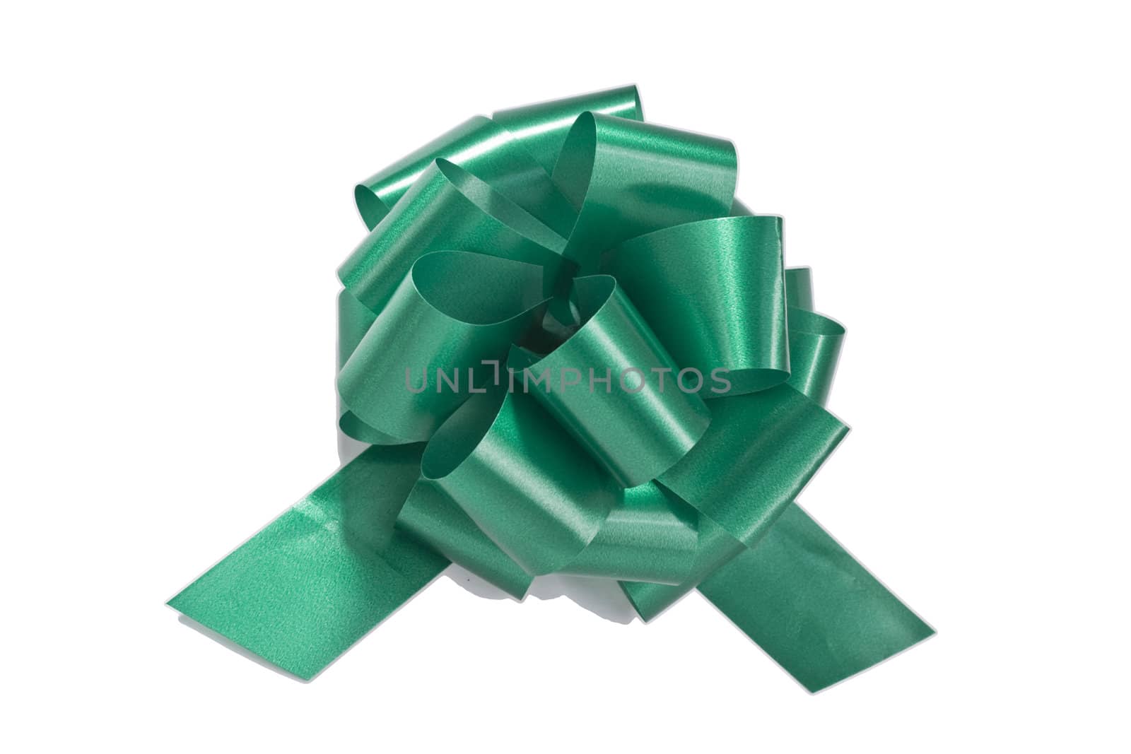 Green gift bow on white background