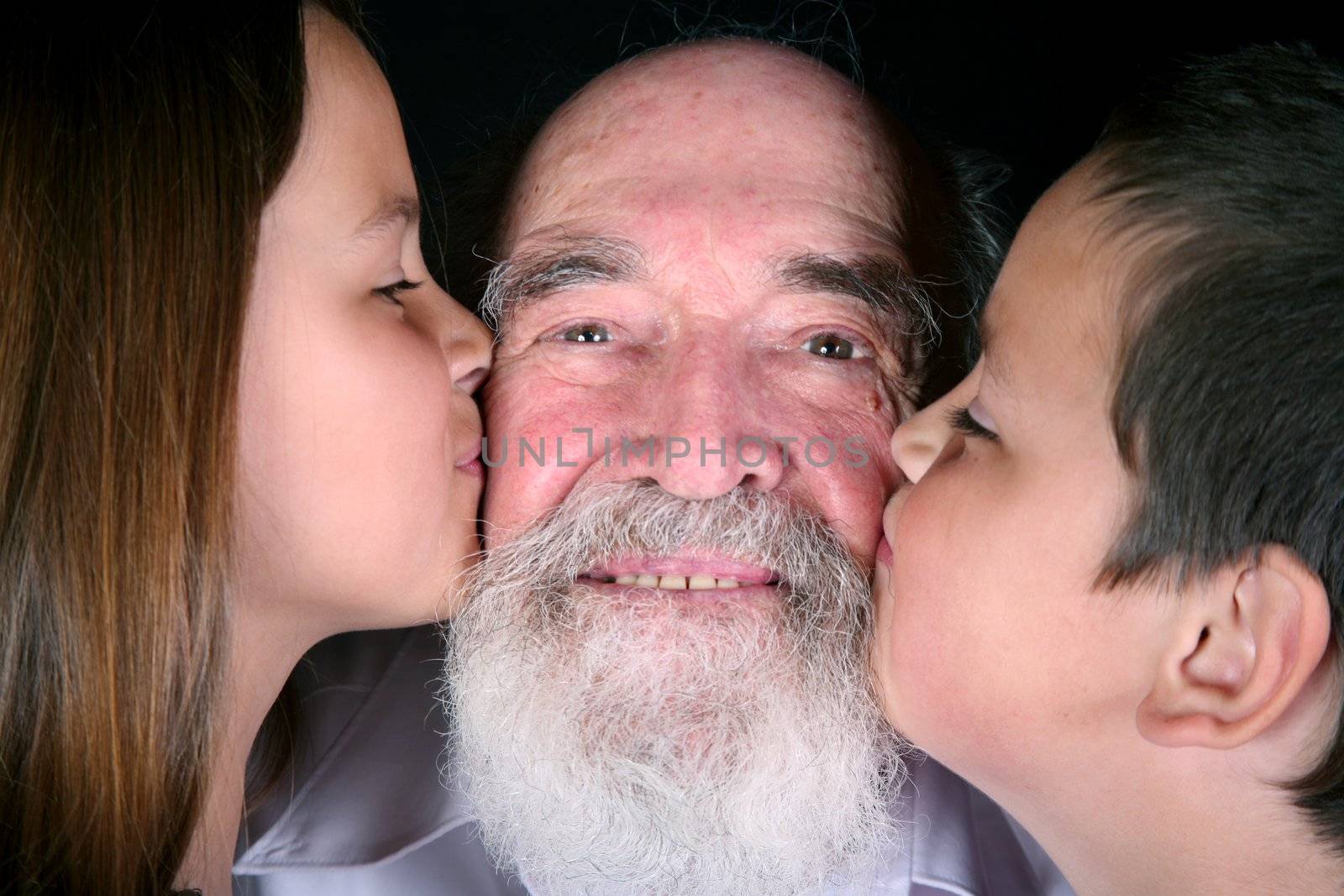 Children showing their love to their grandfather