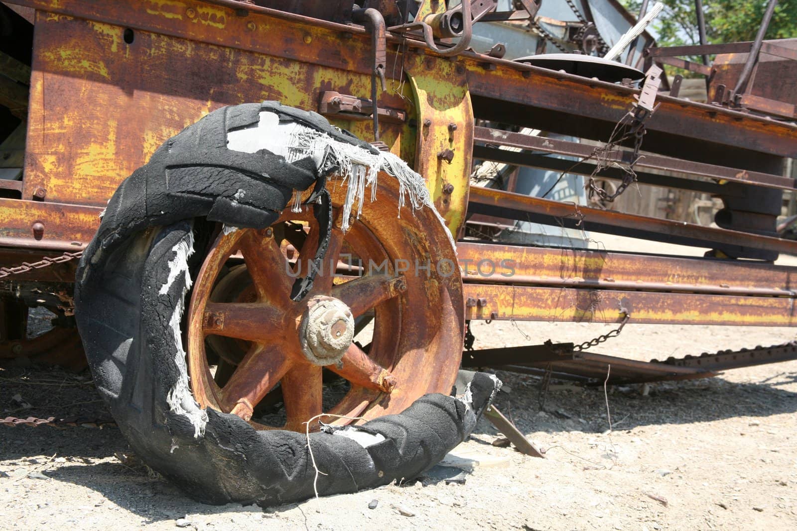 Old-fashioned broken and rust industrial farming equipment