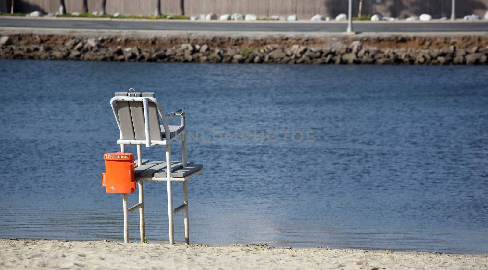 Empty lifeguard chair by scrappinstacy
