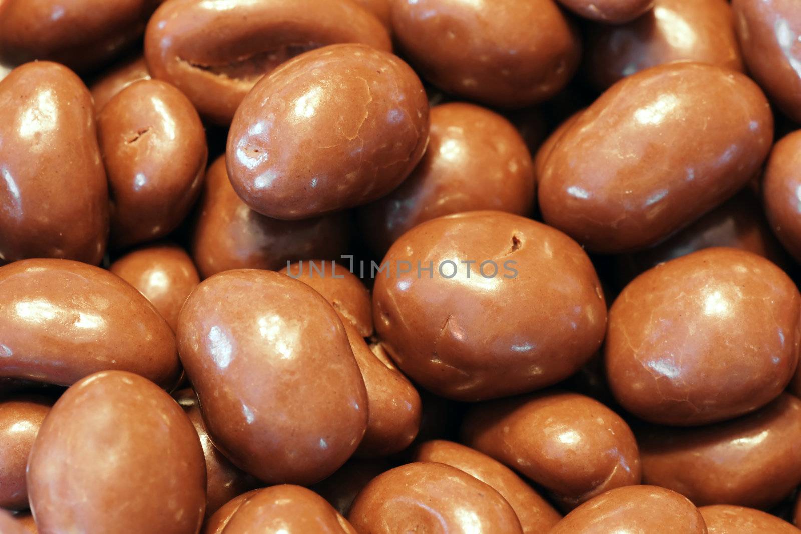Milk chocolate almonds by Mirage3