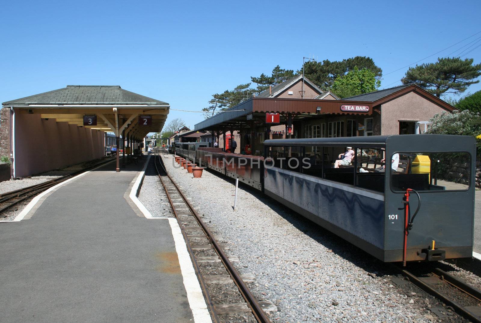 train waiting to leave at a narrow gauge railway station