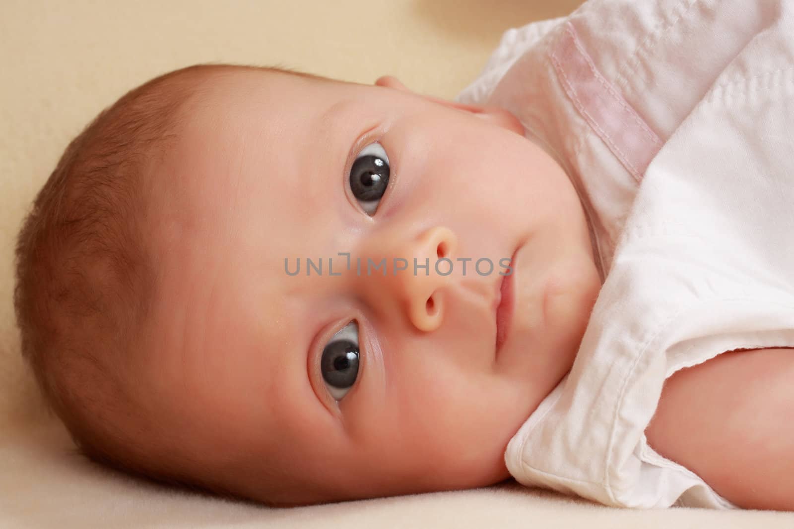 adorable one month caucasian baby girl 