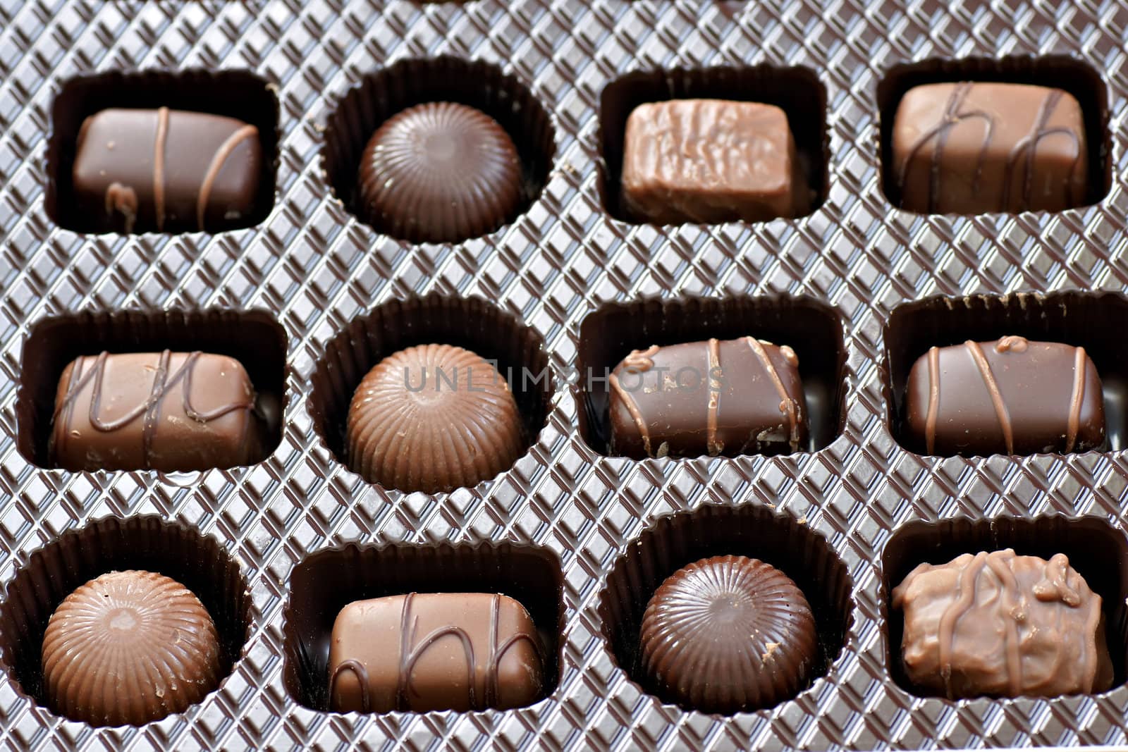 Box of chocolates, dark and milk chocolate, round and squares, all yummy.