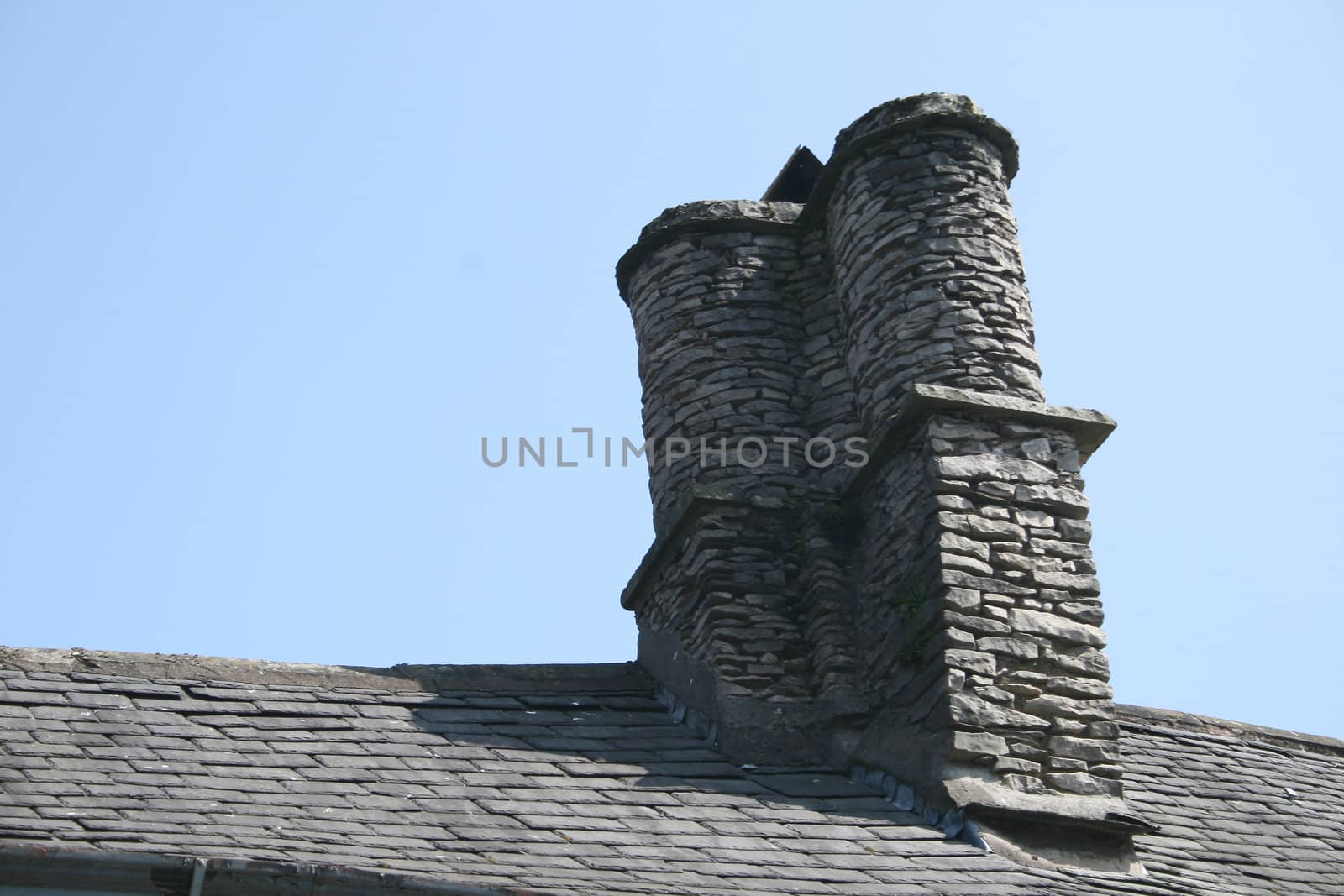 old chimney stack by leafy