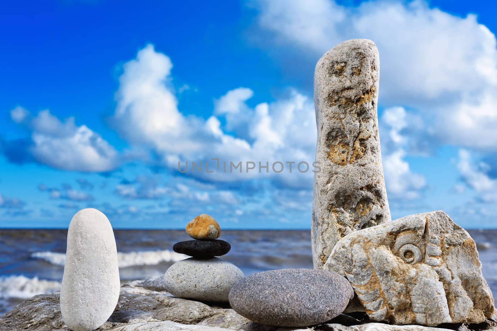 Decorative composition with different cobblestone on the coast