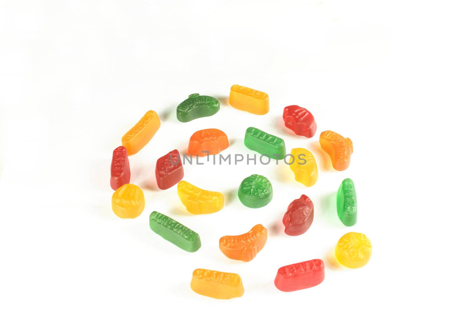 coloured candy sweets isolated over a white background