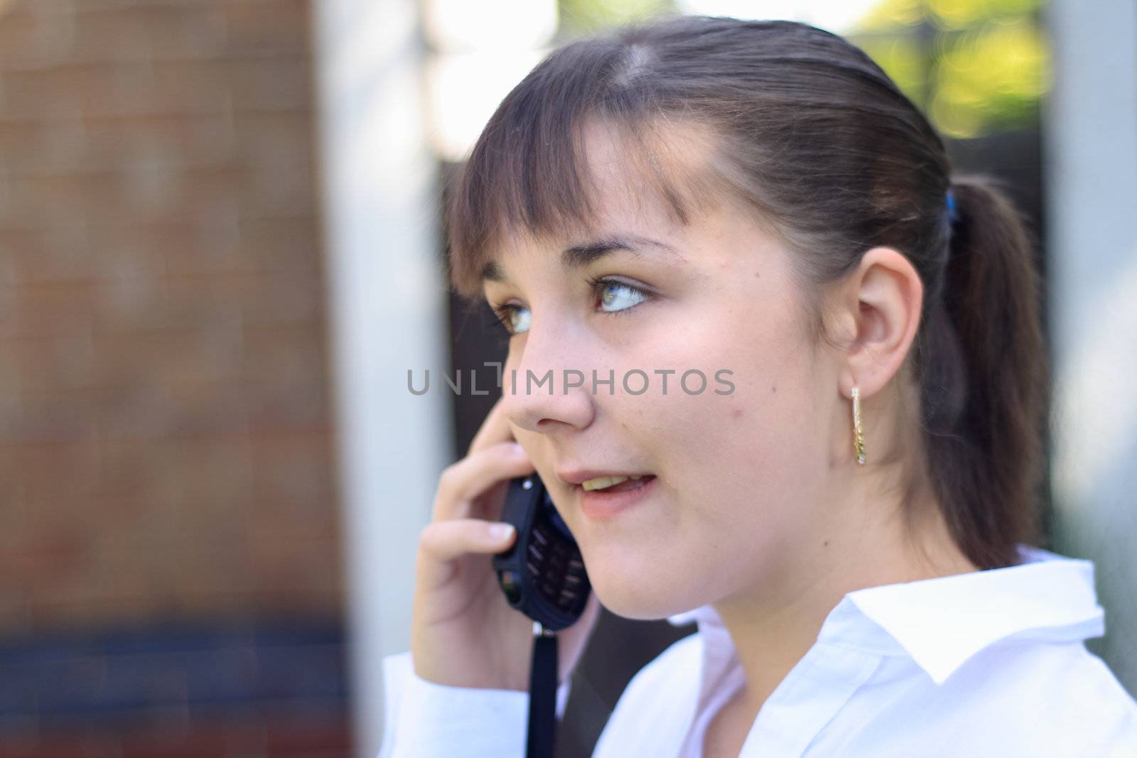 young woman making a call on a mobile phone