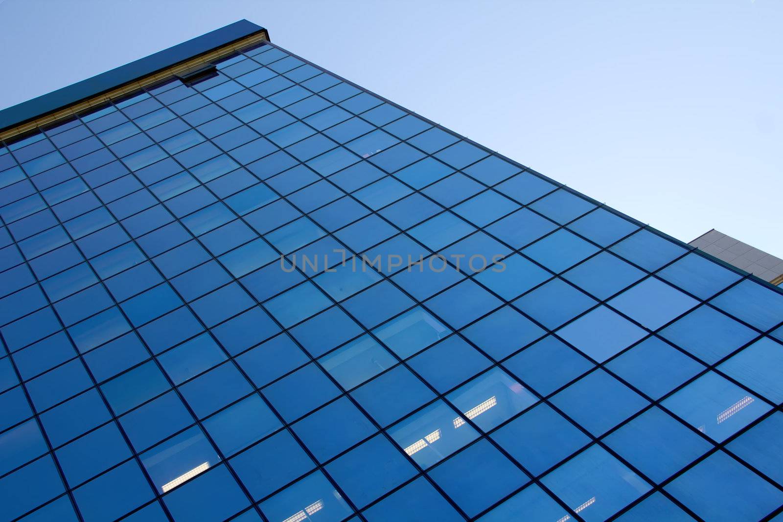 a modern blue glass silhouettes of skyscraper