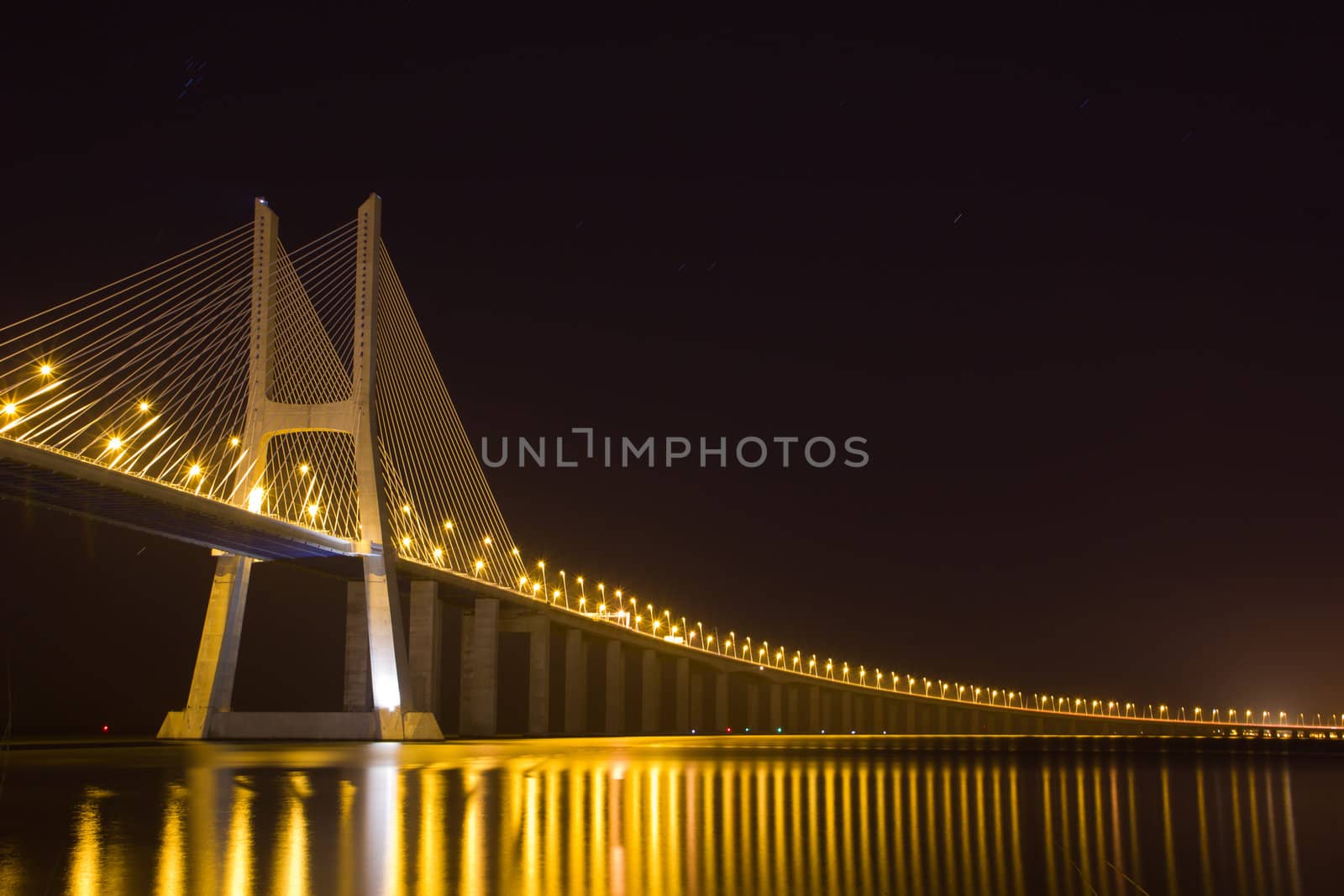 Vasco da Gama bridge on river Tagus, Lisbon at night