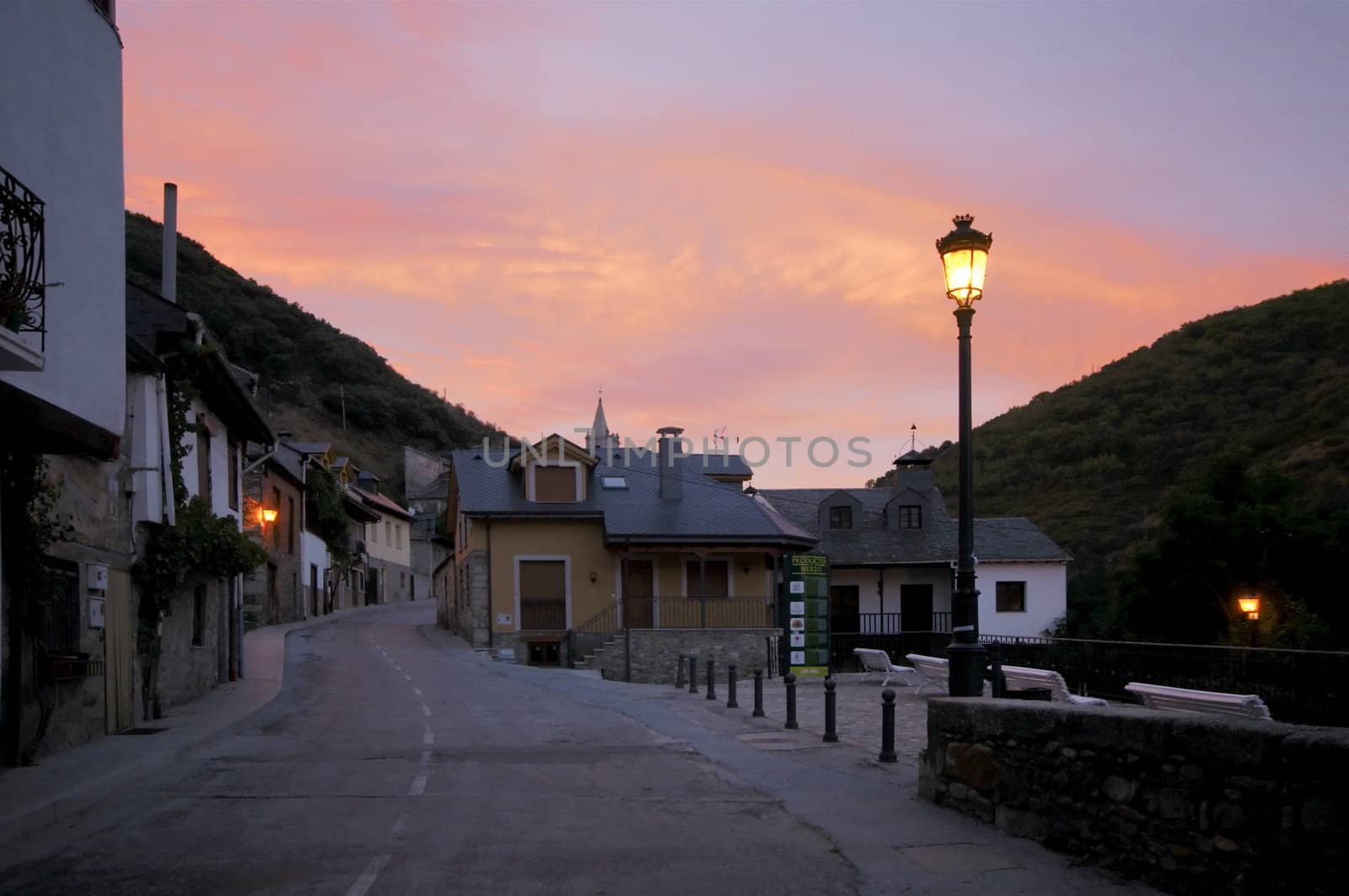 Empty street by sunrise at Molinaseca, Spain