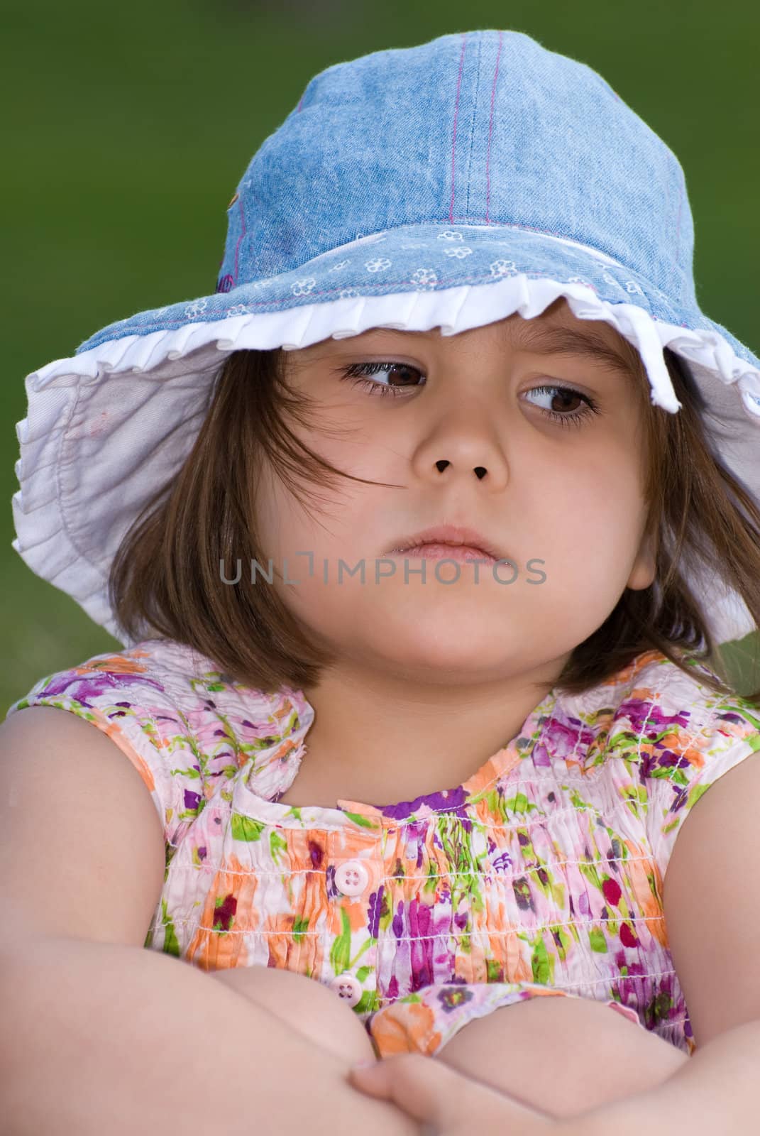 Closeup view of a mad four year old when she was outside