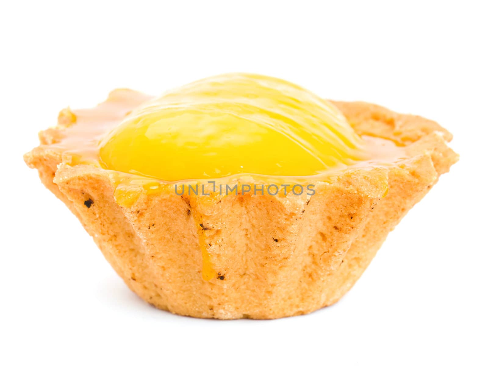 Cake with yellow cream isolated on white