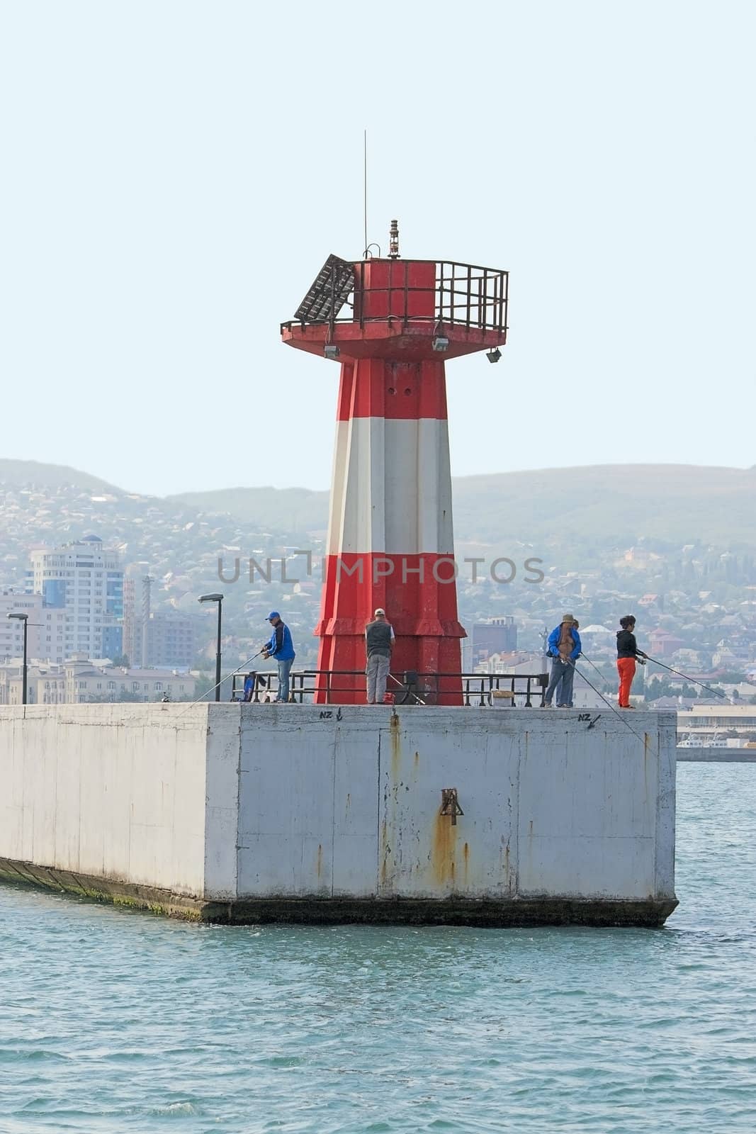 At entrance to port of Lighthouse on shores of Black Sea, Novorossiysk, Russia.