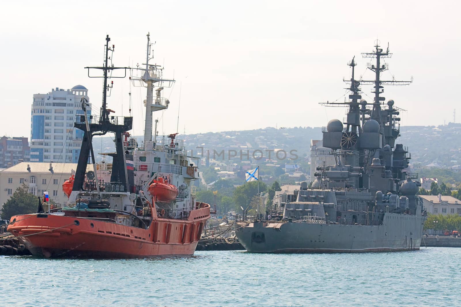 View of ships in port against blue sky, Novorossiysk, Russia.