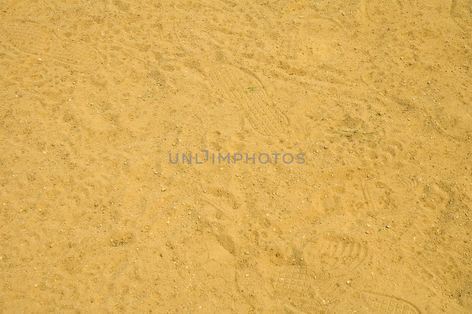 baseball field, several players footprints 