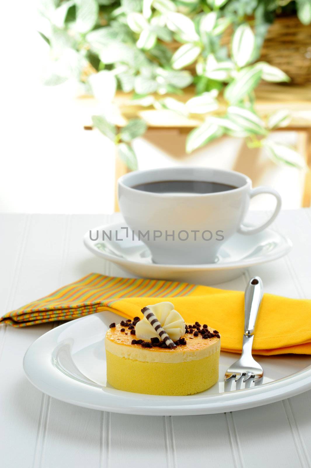 Delicious lemon cake served with fresh coffee.