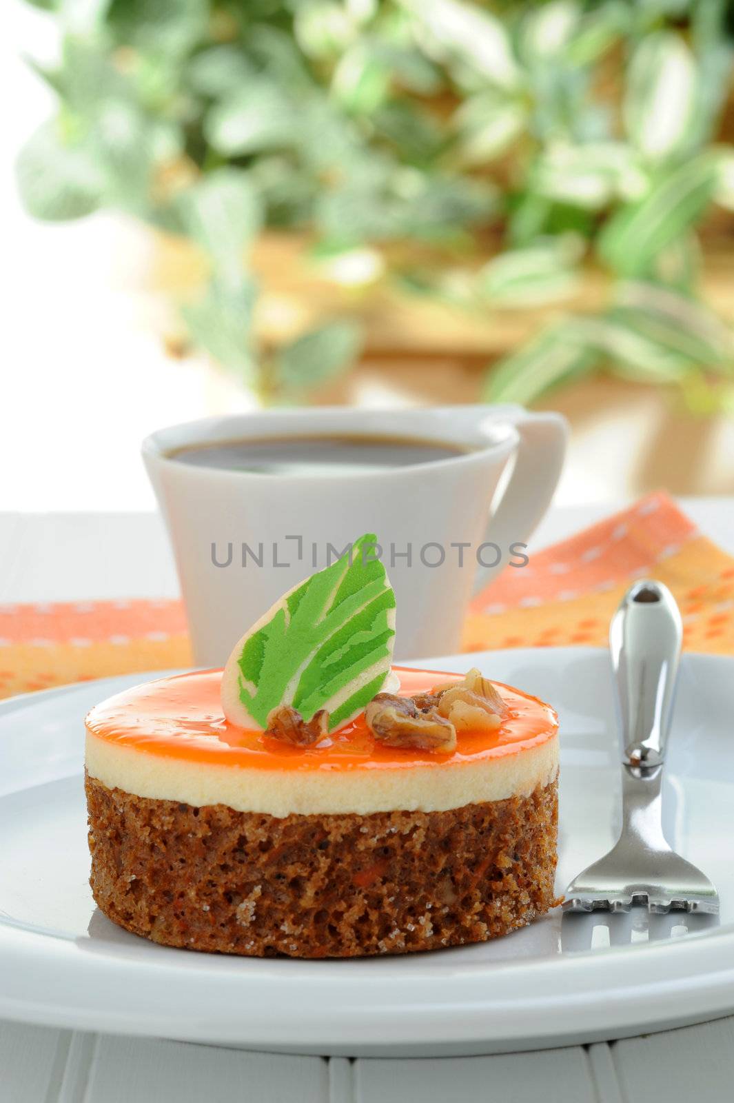 A serving of an nontraditional carrot cake and coffee.