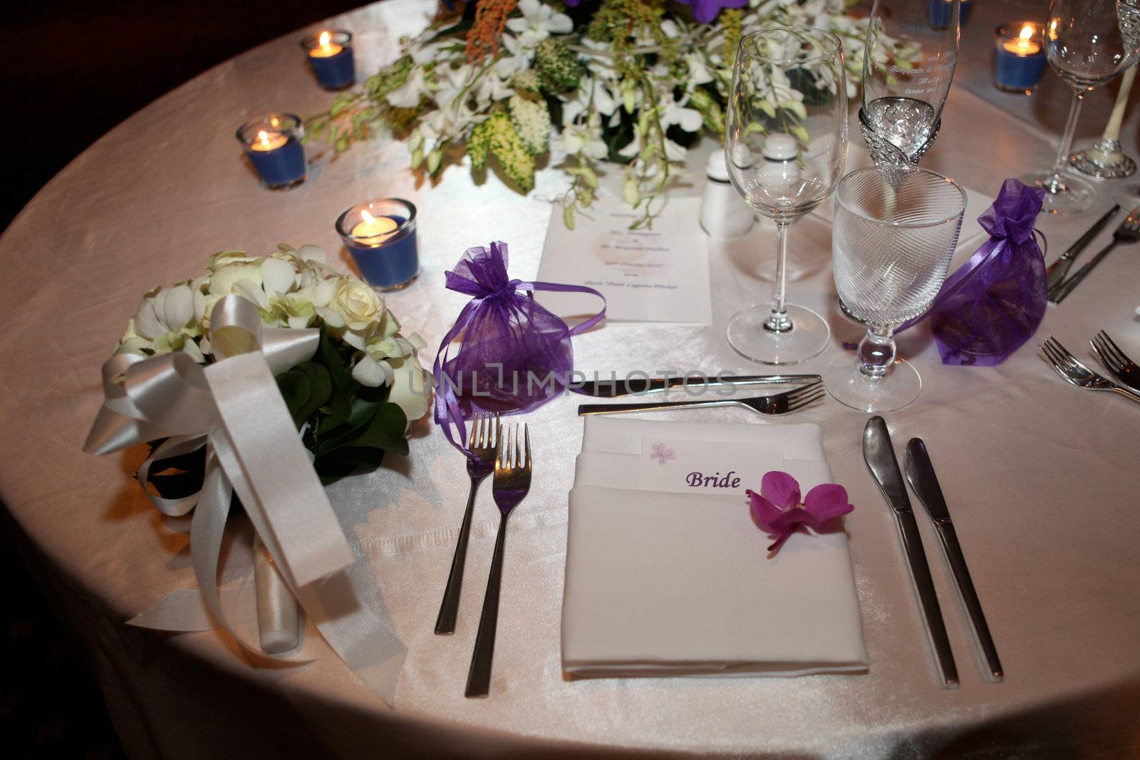 Tables decorated for a wedding reception.