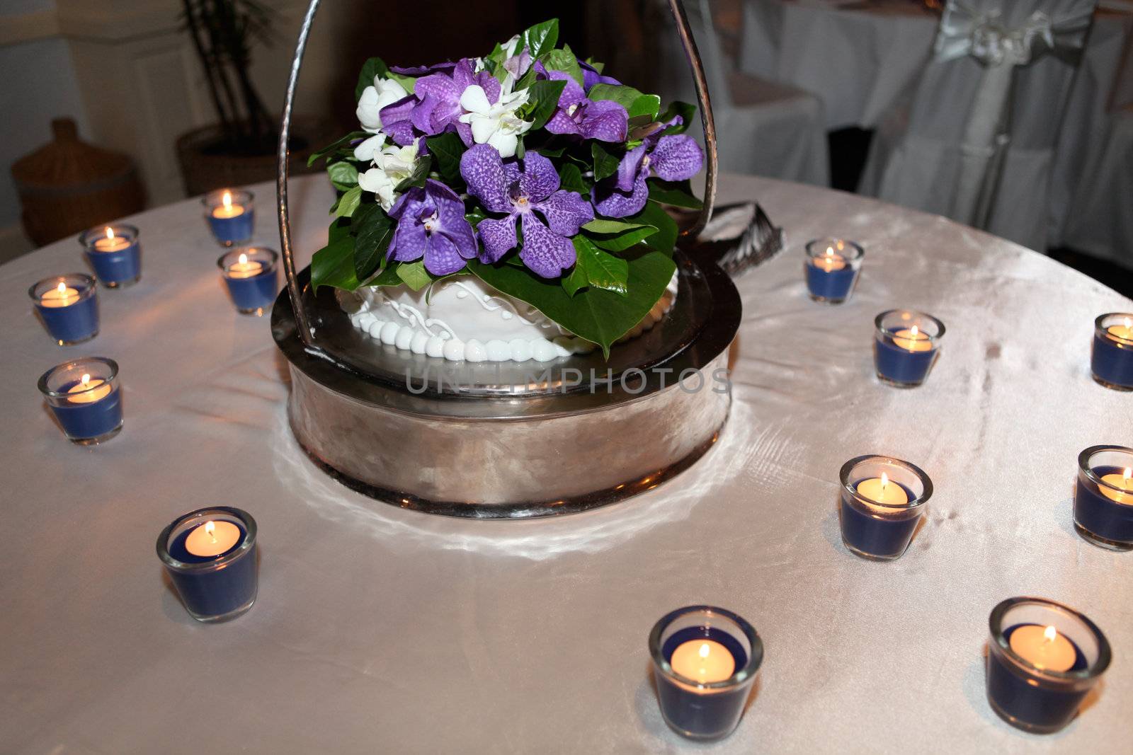 Tables decorated for a wedding reception.