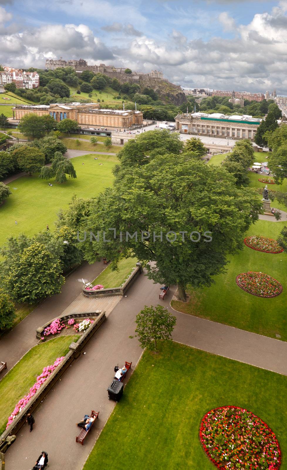 The gardens alongside Princes Street in Edinburgh, Scotland, with the National Gallery beyond and the castle on the skyline.