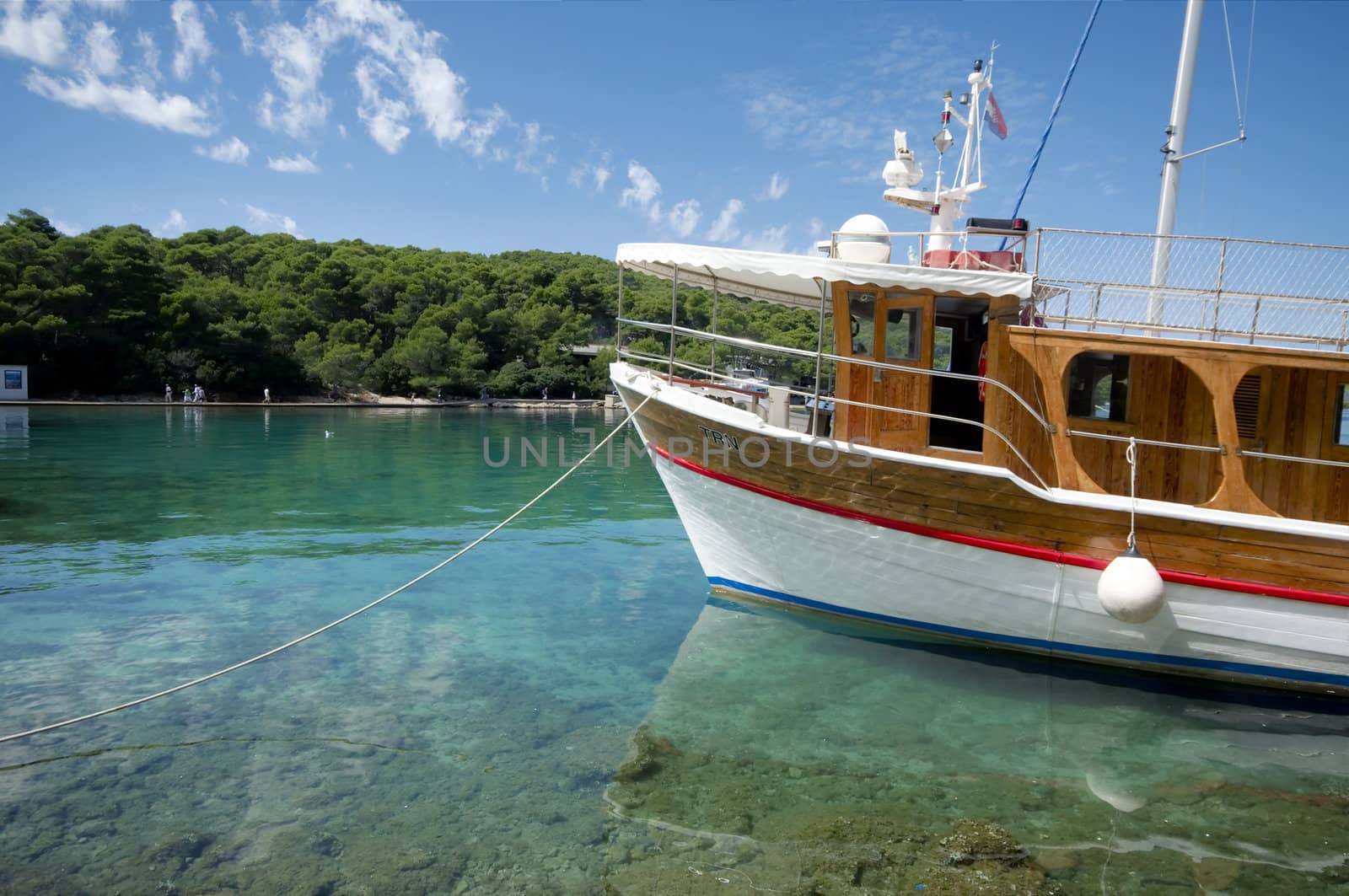 Anchored ship in clear waters of the Mediterranean Sea