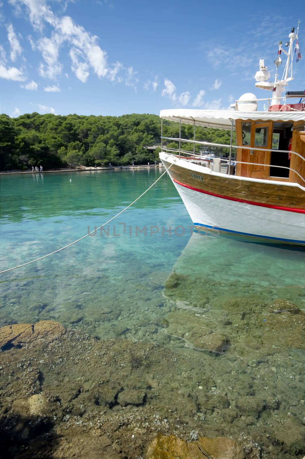 Anchored ship in clear waters of the Mediterranean Sea