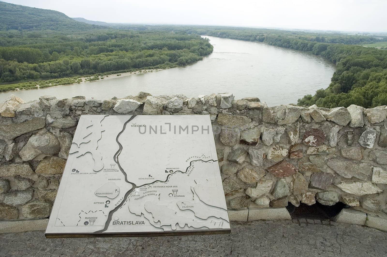 view from famous landmark - devin castle, river donau dividing slovakia and austria, map in foreground