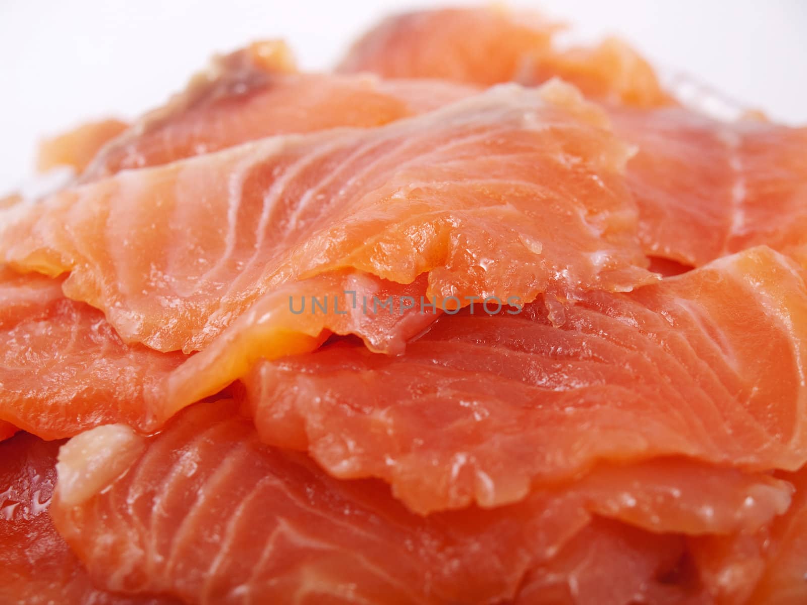 Close-up picture of finely sliced salmon