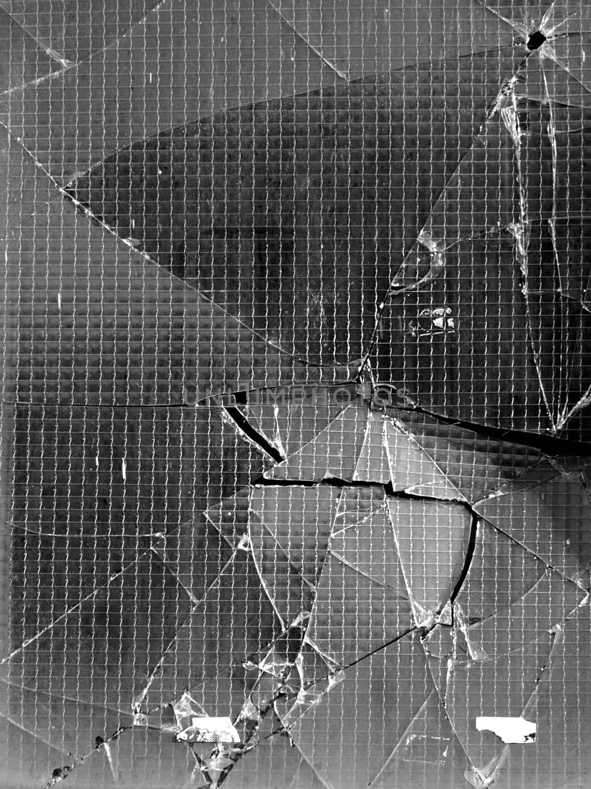 Detail of a broken glass window pane