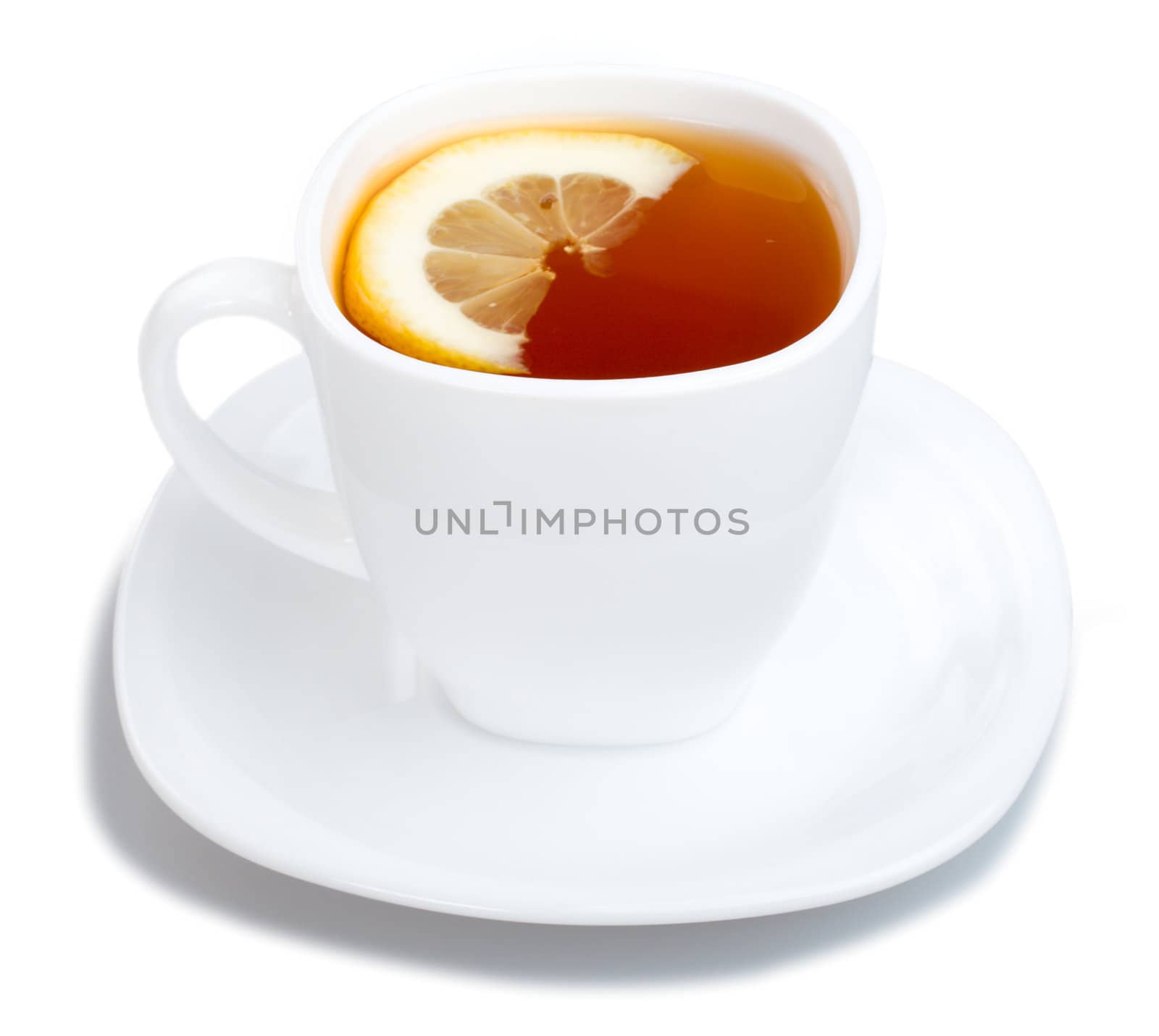 cup of tea with lemon and saucer on white by Alekcey