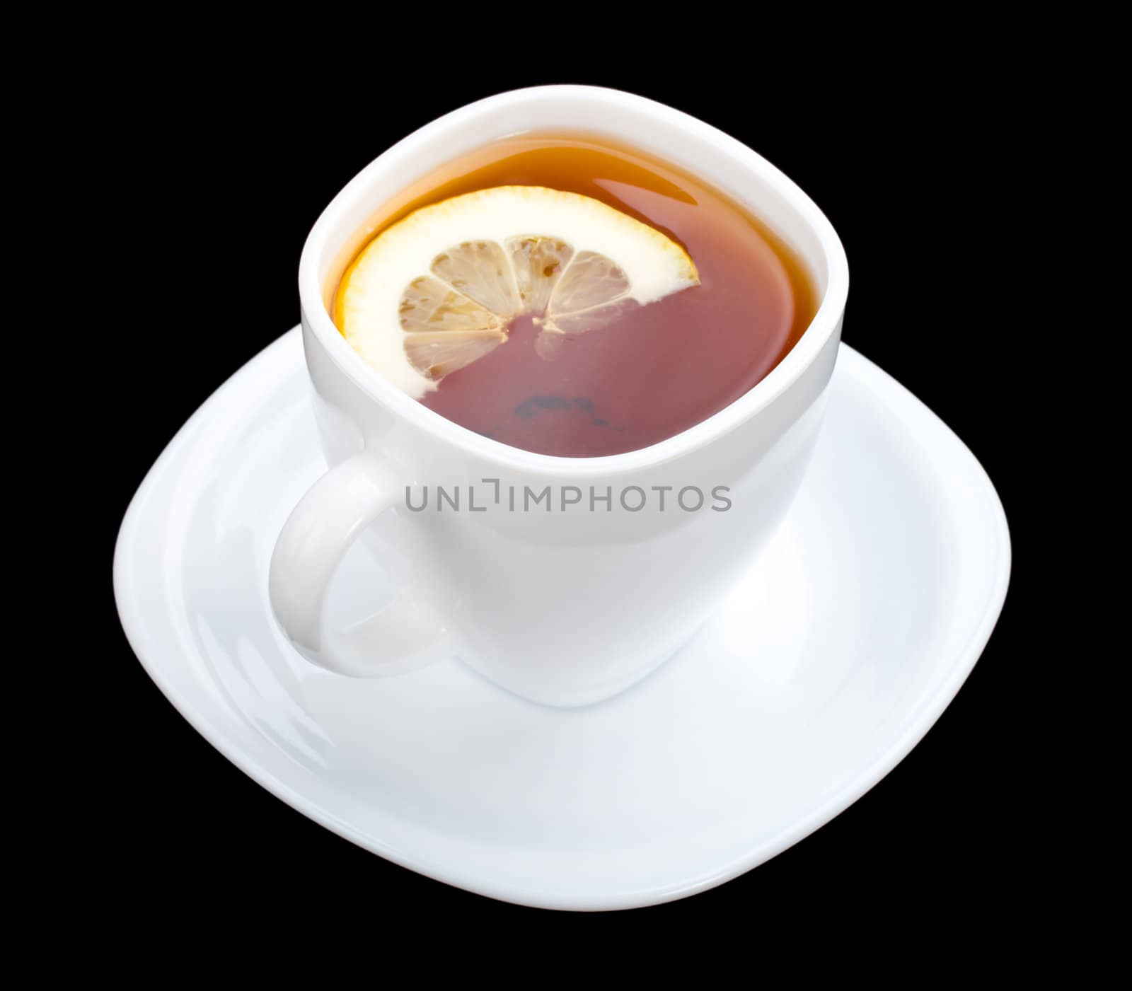 cup of tea with lemon and saucer, isolated on black