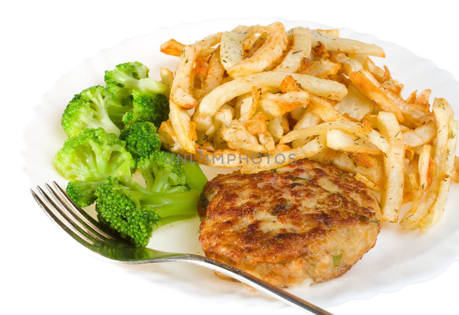 cutlet with broccoli and potatoes on plate, isolated