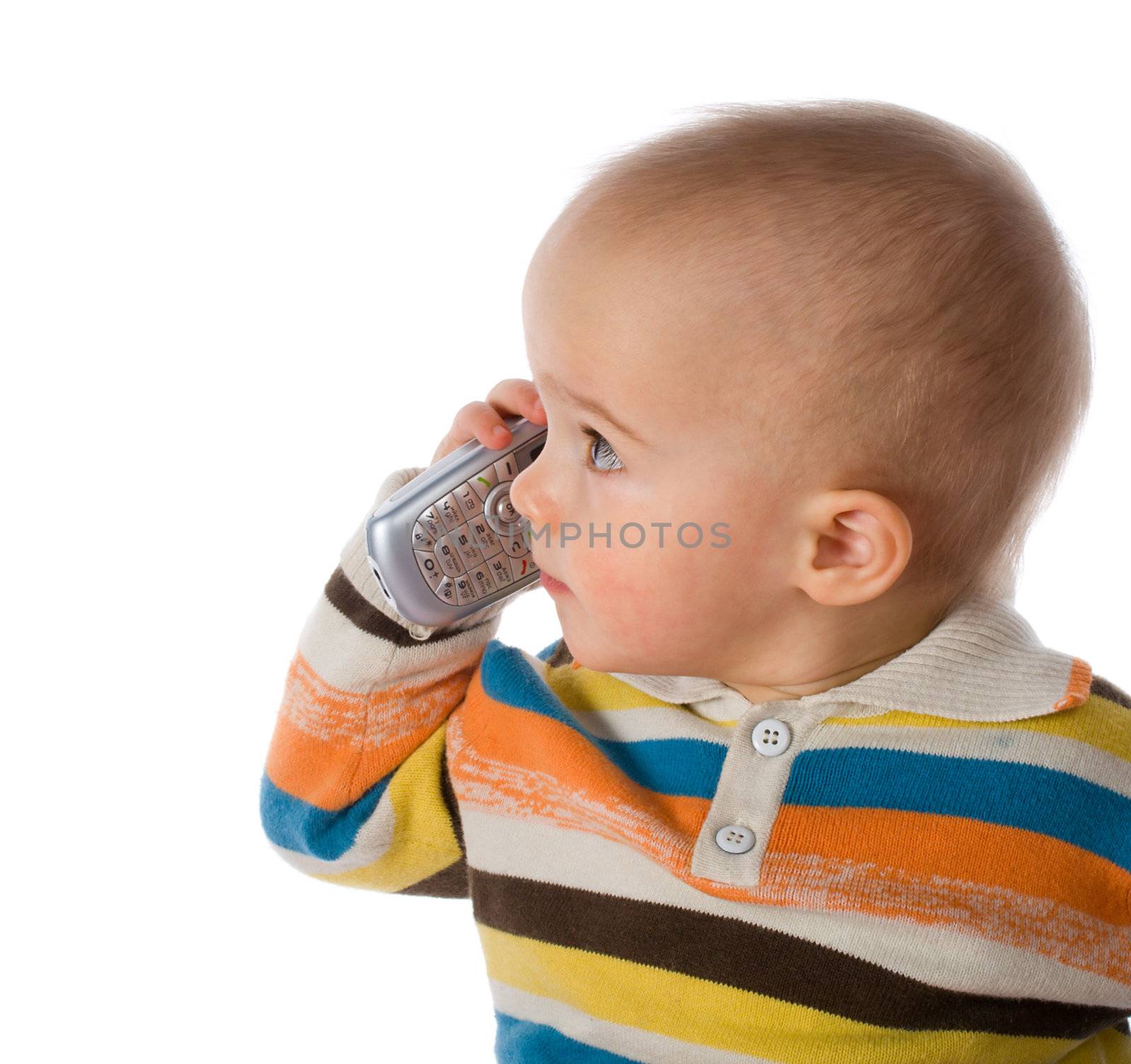 little boy talking on phone, isolated on white