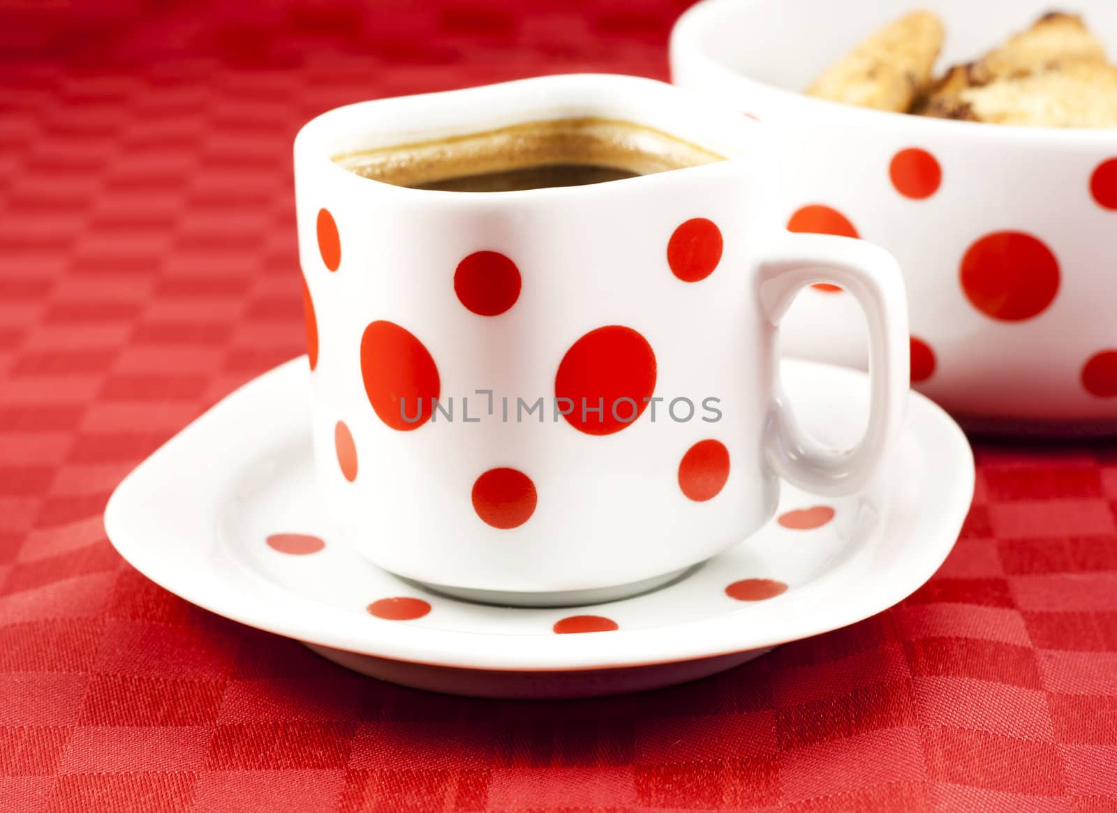 Cup of strong Turkish coffee with cookies on a table