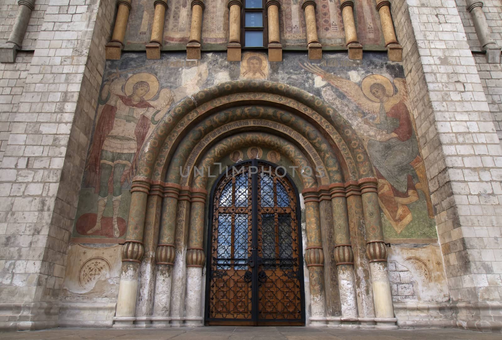 Main gate entrance into the Cathedral of the Assumption in the Kremlin. by Claudine