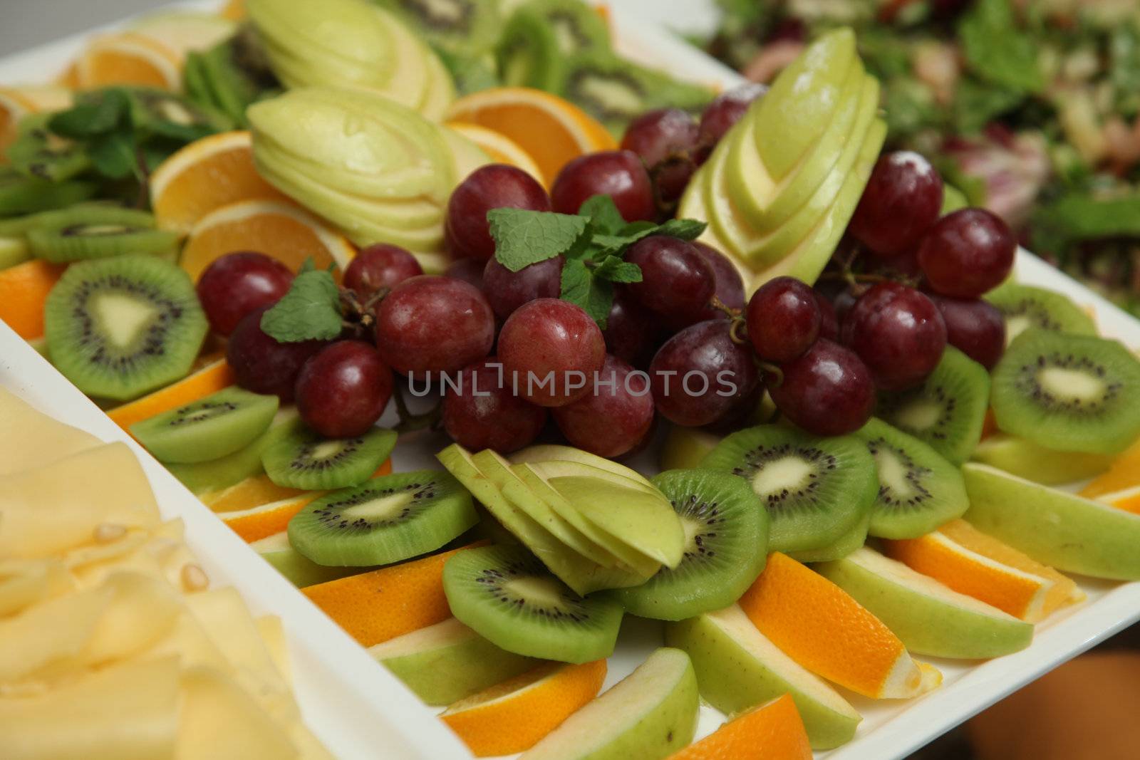 Assorted fruits for the buffet on a platte