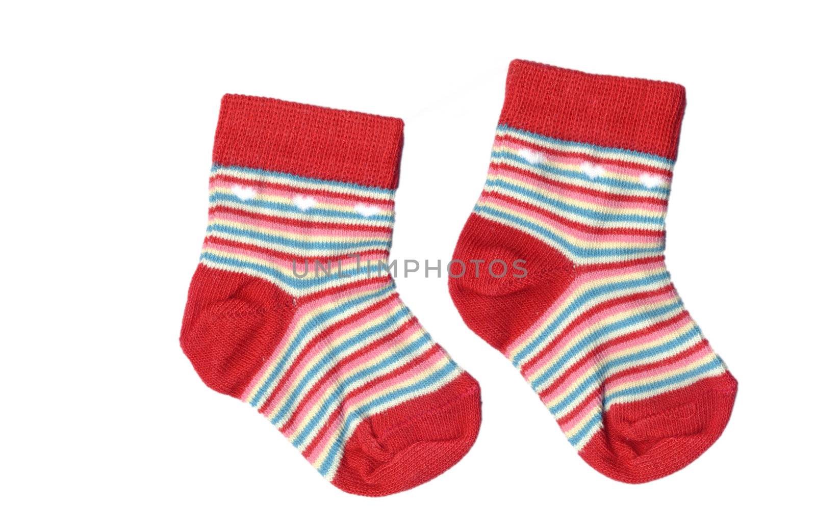pair of red toddlers socks isolated over white