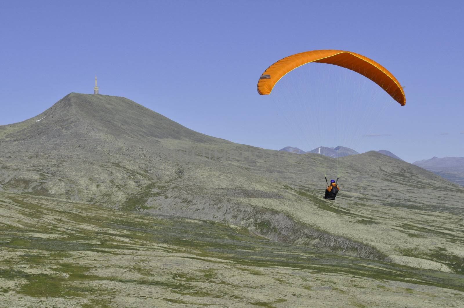 paraglider in the mountains by kalleballes