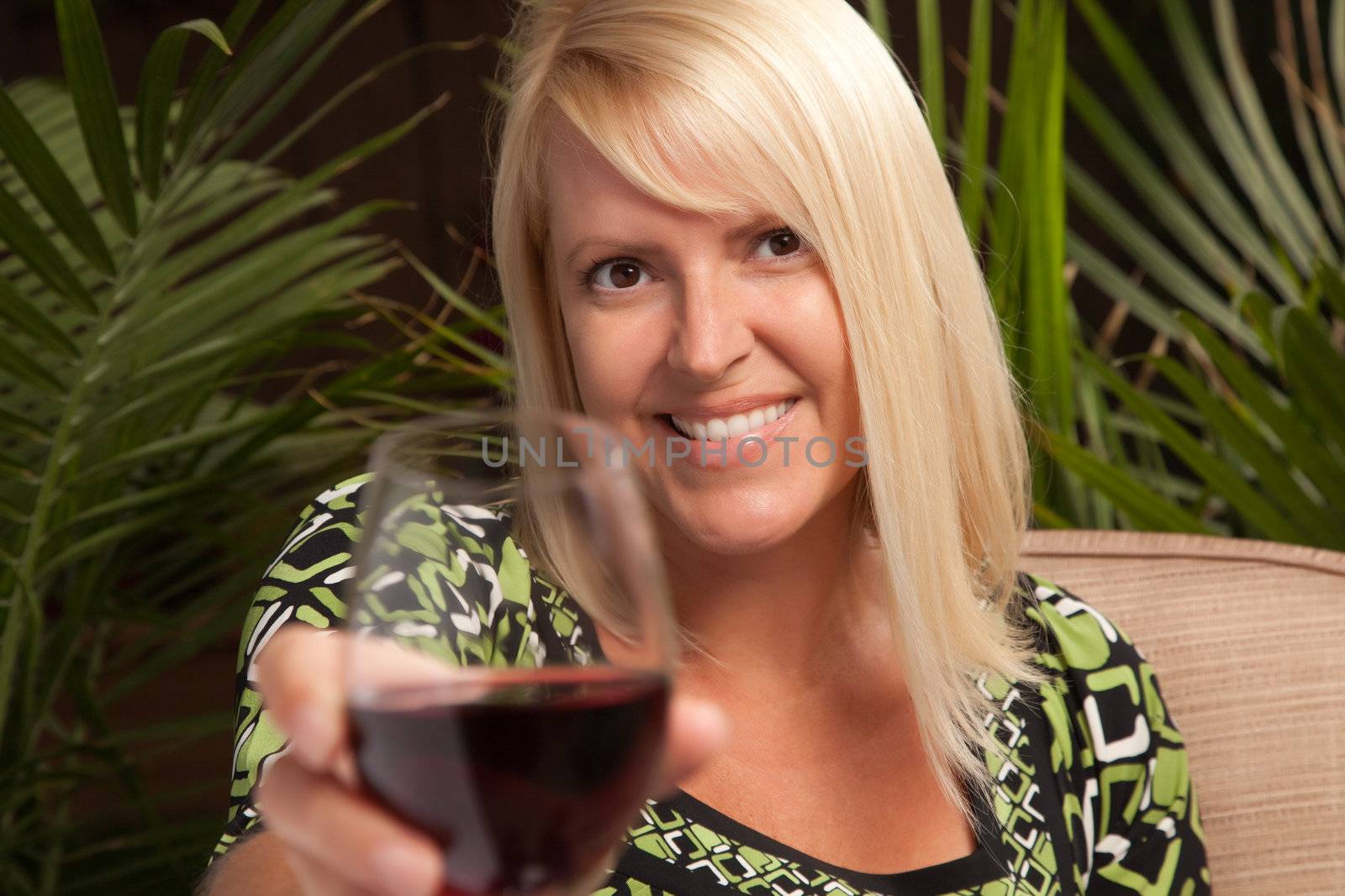 Beautiful Blonde Enjoying Wine by Feverpitched