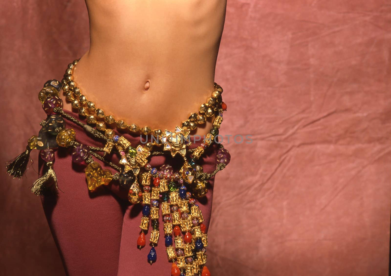 woman in jewelry in belly