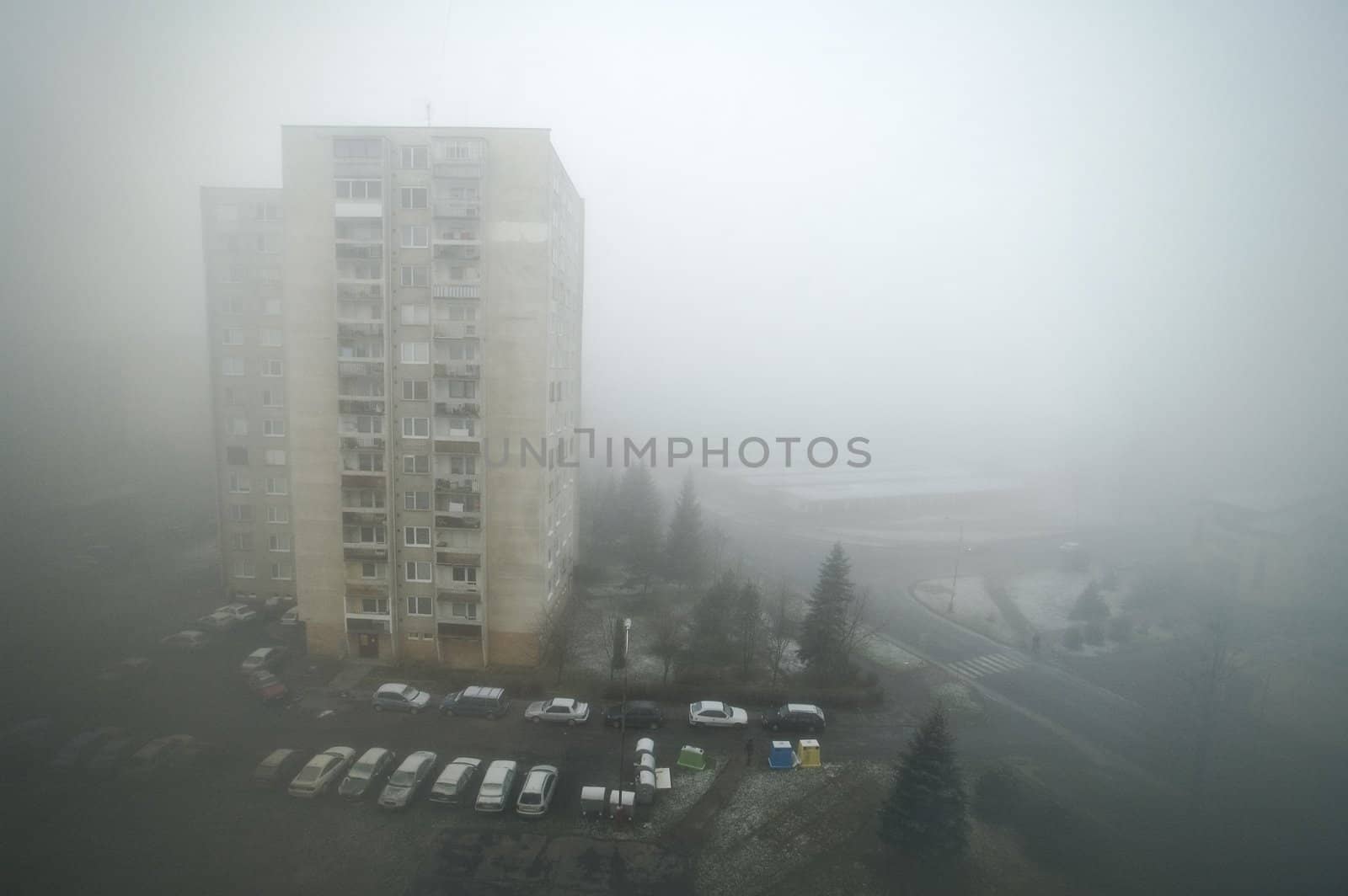 mist surrounding typical slovakian building, photo taken in Humenne
