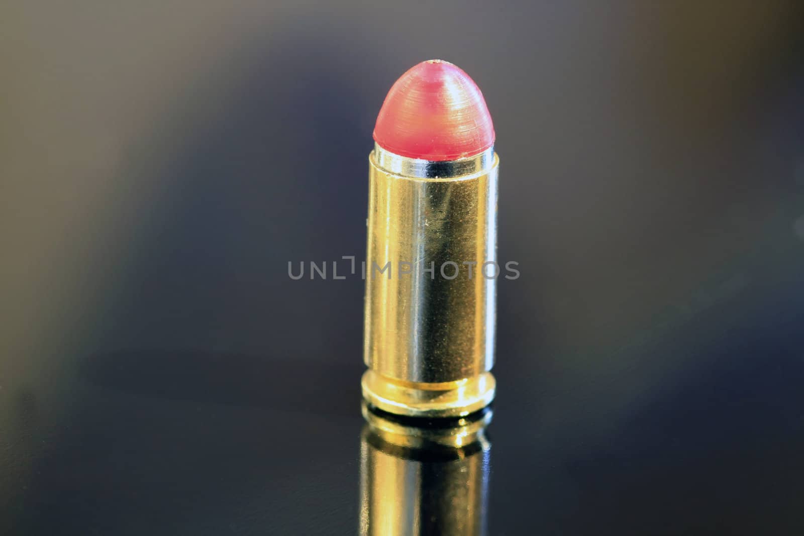 9mm bullet isolated on black by ChrisAlleaume