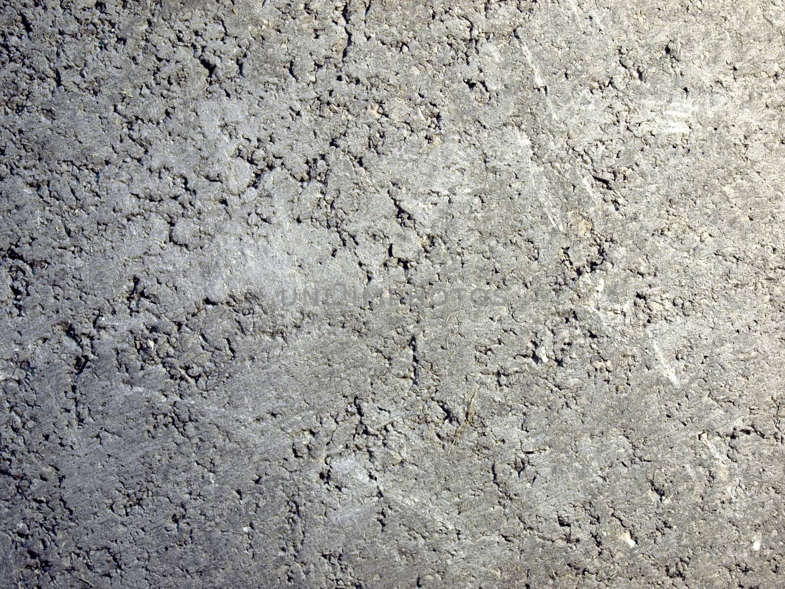 Reinforced concrete wall useful as a background